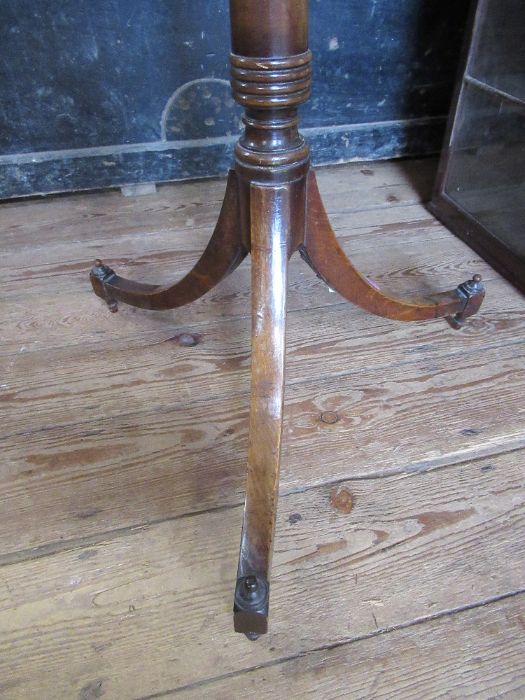 A 19th mahogany dish top tripod table, raised on turner column terminating with three out swept - Image 3 of 3