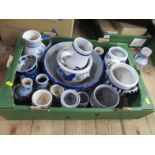 A collection of continental blue and white jugs, tankards, bowls, etc.