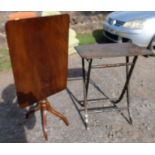 A mahogany tilt top table, together with a folding table with poker work style decoration