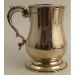 A silver baluster mug, with presentation inscription, Birmingham 1931, weight 12oz, height 5.25ins