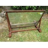 A mahogany swing frame mirror