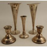 A pair of hallmarked silver trumpet vases, height 8ins, together with a pair of dwarf candlesticks