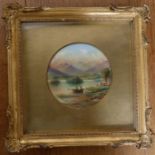 A Paragon porcelain plaque, decorated with a view of Rydal Water by F Micklewright, diameter 4.5ins