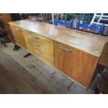 A 1970s style sideboard, width 72ins, depth 18.5ins, height 31ins