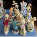 A set of twelve Royal Worcester months of the years figures, modelled by Doughty, November smashed -