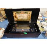 A 19th century Swiss table top cylinder music box, playing 8 airs, with paper label to interior of