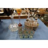 A set of six tumblers, together with a silver plated cruet set, a decanter (missing stopper) and a