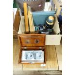 A collection of vintage rulers, boxed stereoscopic viewer and cards, Russian doll etc