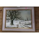 J Holt, oil on board, winter scene with figure on a lane, 9.5ins x 13.5ins