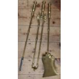 A set of late Victorian brass fire irons, stamped Reg No 291337-291338 to shovel