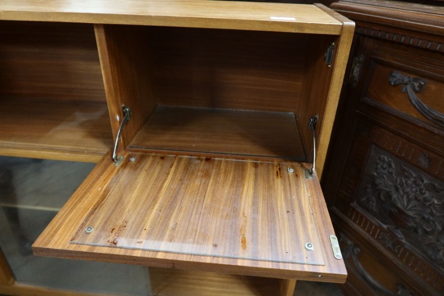 A retro set of glazed shelves, width 48ins, height 37.5ins together with a walnut cabinet, raised on - Image 2 of 3