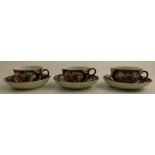 Two18th century Worcester teacups and saucers, the scale blue ground decorated reserve panels of