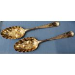 A pair of mid 18th century silver berry serving spoons