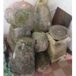 A collection of garden stoneware to include staddle stones