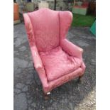 A Georgian design wing back armchair