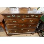 An 18th Century walnut chest of drawers, having two short over three long drawers, raised on bracket