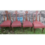 A set of four Edwardian chairs, with line and floral inlay