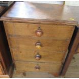 An Antique mahogany bedside chest of four drawers