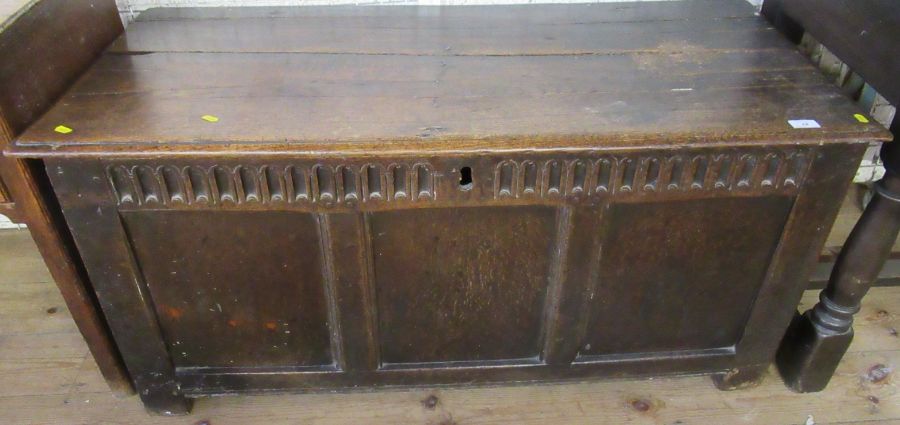 An Antique oak coffer, width 48ins, height 23ins, depth 23ins