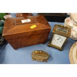 A 19th century mahogany sarcophagus shaped tea caddy, together with a carriage clock and a lighter