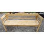 A pine bench, width 70ins, height 34ins