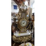 A 20th century French style gilt metal mantel clock, in the empire style