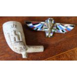 A clay pipe decorated with Derry Castle, together with an Egyptian themed brooch