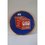 A circular enamel OXO Cube sign, diameter 12ins