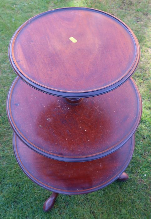 A 19th century mahogany three tier dumb waiter, raised on a tripod base, height 43ins, diameter of - Image 2 of 3