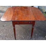 A 19th century mahogany pembroke table, fitted with one real and one dummy end drawer, raised on