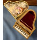 An enamel and gilt metal piano musical box, decorated with figures in landscape and cherubs