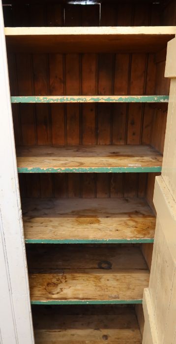 A painted pine cupboard, the pair of doors revealing shelves, height 73ins, width 48ins, depth - Image 2 of 2