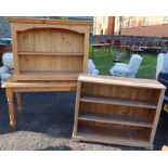 A pine kitchen table, raised on turned legs, 60ins x 30.5ins, height 30ins, together with a modern