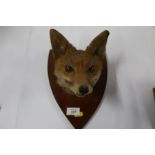 Two taxidermy wall masks, of a fox and a badger (36733)