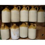 A collection of stoneware flagons