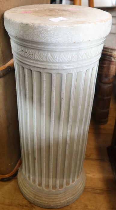 A stone plinth, in the classical style, diameter 10ins, height 24ins