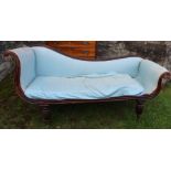 A Regency mahogany framed settee, with scroll end, on reeded legs, length 70ins