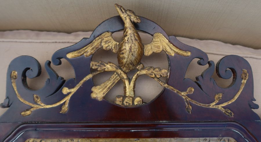 A Georgian design fret cut wall mirror, decorated with a gilded Ho-Ho bird, overall 31ins x 17.5ins, - Image 2 of 3