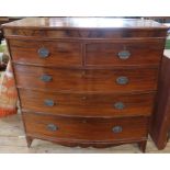 A 19th century bow front chest, of two short over three long drawers, 48.5ins x 24ins, height 48ins