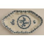 A Worcester spoon tray, painted in underglaze blue with fruit in a wreath, length 6ins - marked,