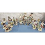 A collection of Continental porcelain figures, some with mock gold anchor mark, together with two