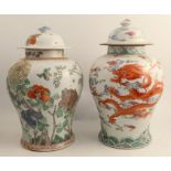 Two Chinese baluster vases and covers, one decorated with three claw dragons, another with birds and