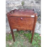 A 19th century mahogany pot cupboard, with sliding door, 18ins x 23ins, height 30.5ins
