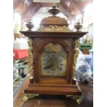 A mahogany bracket clock, with applied gilt mounts, total height 22ins, width 13ins