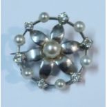 A white gold old-cut diamond and cultured pearl wreath brooch, claw set six old-cut diamonds,