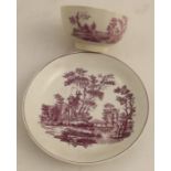 A Worcester tea bowl and saucer printed in lilac with Hancock's The Bird Coop