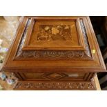 A 19th century walnut and mahogany cased table top polyphon, with inlaid and carved decoration,
