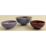 Three Ruskin pottery bowls, two af, two dated, diameter 3.25ins and down