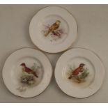 Three Royal Worcester small plates, decorated with a Wood Lark, a Yellow Hammer and a Whinchat by