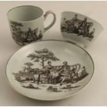 A Worcester tea bowl, coffee cup and saucer printed in black by Hancoc